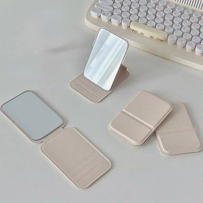 Espejo plegable de maquillaje de cuero PU – Elegante espejo de mano compacto para viajes y uso diario